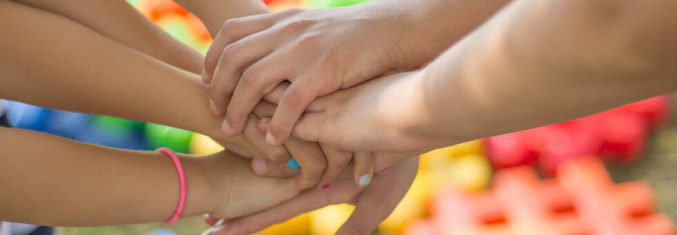 Medical Marijuana Use In Children: Children holding hands.